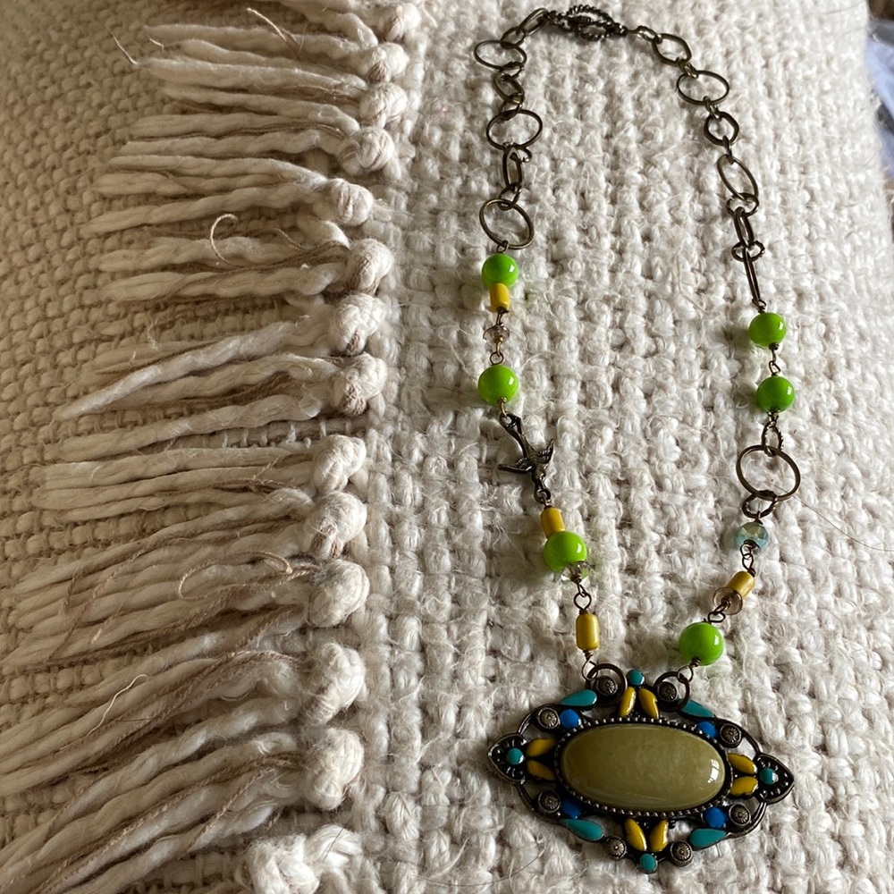 9 1/2 inch ladies necklace- Antique gold with green stones. Pendant is olive gr.